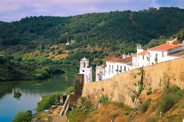 Fototapeta na wymiar View of Mertola Town and the Guadiana River on foreground in Alentejo, Portugal