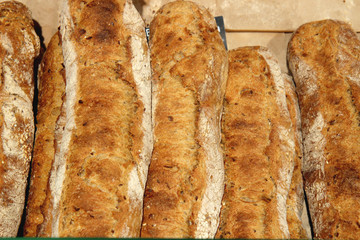 Loaf of bread.  Many fresh baguettes. Baguettes from bakery.