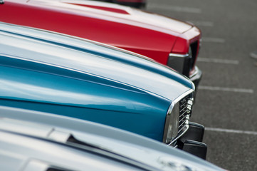 Mulhouse - France - 12 June 2019 - closeup of vintage cars alignment parked in the street