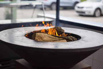 metal firewood bowl hot restaurant 