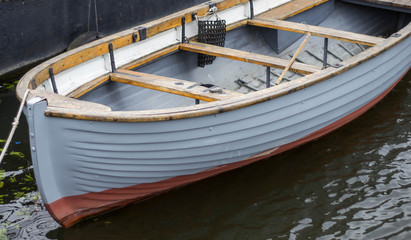 Fototapeta na wymiar wooden boat small sea water