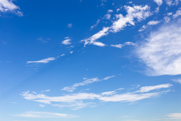 Naklejka na ściany i meble Blue sky background with beautiful clouds