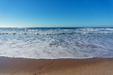 Ocean seascape with soft wave on clear day
