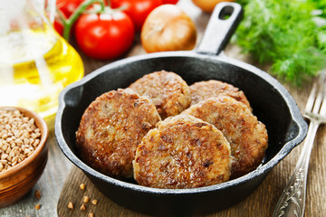 Buckwheat  burgers on the pan