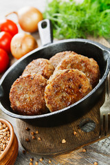 Buckwheat  burgers on the pan