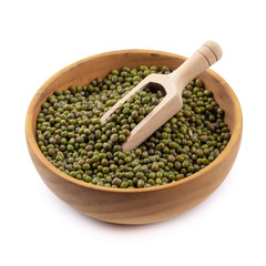 Raw mung bean or green bean in a wooden bowl isolated on white background