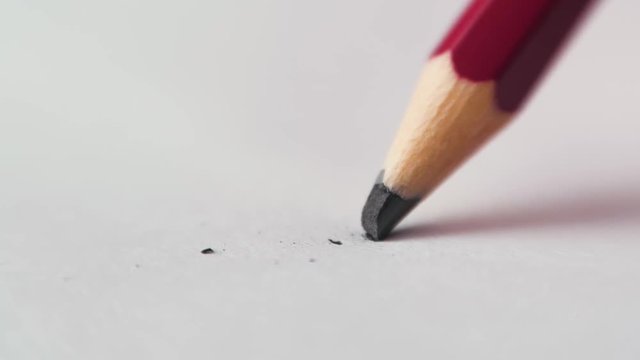 A pencil core breaks in slow motion.