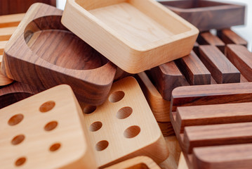 Assortment of wood handcraft pieces on white background