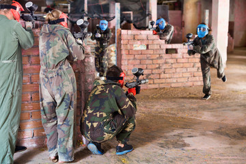 Fototapeta premium Teams on the paintball ground