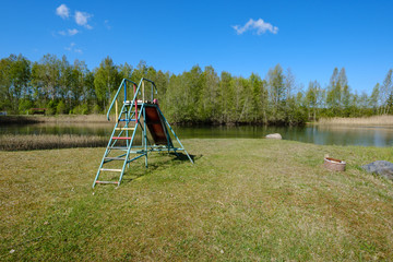 Obraz na płótnie Canvas recreation camping area by the blue lake in sunny summer day