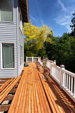 Outdoor Wooden Deck Being Completely Remodeled During Springtime