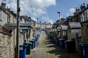 Fototapeta na wymiar rubbish bins near terraced houses in England