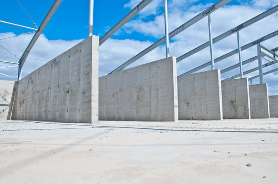Reinforced concrete construction at the construction site. The use of concrete and metal frame for the construction of buildings and structures.
