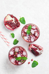 Hibiscus pomegranate kombucha mocktail. Top view, space for text.