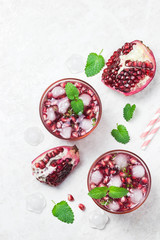 Hibiscus pomegranate kombucha mocktail. Top view, space for text.