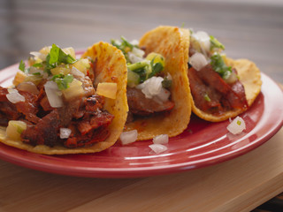 Soft Tortilla Tacos with Spicy Sauce and Tomato Onion and Cilantro 