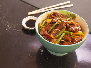 Bowl of Asian Food Style Angus Meat with Vegetables and Soy Sauce 