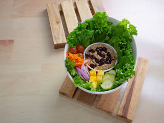 Fresh Smokey Sauce Tuna Salad Bowl with Grapes Carrots Onions Mango and Cucumbers 