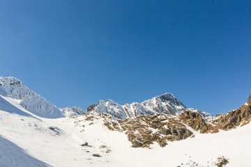 winter landscape with the mountain peaks covered by heavy snow. aerial view by drone. romanian mountains, Negoiu peak, Fagaras Mountains