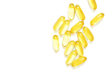 Omega 3 fish oil capsules on white background. Concept of healthcare. Top view, flat lay, copy...