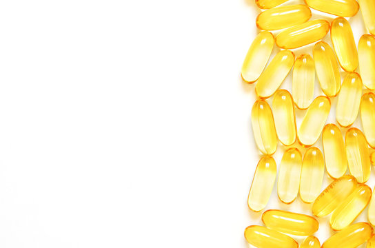 Omega 3 Fish Oil Capsules On White Background. Concept Of Healthcare. Top View, Flat Lay, Copy Space.