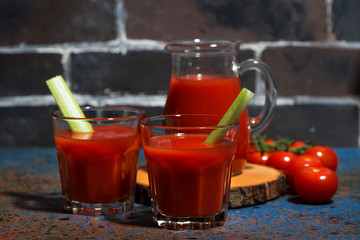 fresh tomato juice in glass cups