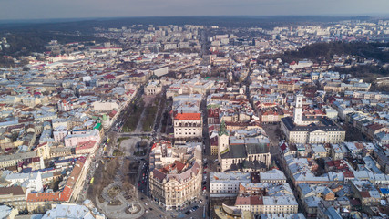 Obraz premium Rooftops of the old town in Lviv in Ukraine during the day. The magical atmosphere of the European city. Landmark, the city hall and the main square.