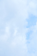 Blue sky with white clouds background texture. Copy space.