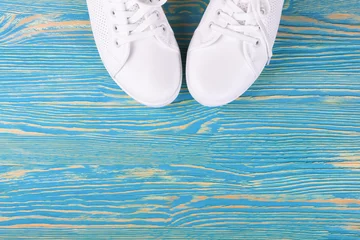 Poster white sneakers on color background. copy space. © katyamaximenko