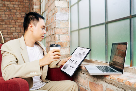 Entrepreneur analyzing financial document