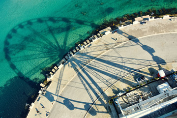 Beautiful landscape and panorama with the view of Adriatic sea , lungomare Bari and wheel's shadow , Pugia region , Italy. 