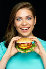 woman with burger and french fries