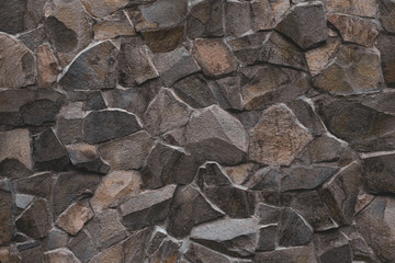 Old dirty wall texture. Brown stone wall background, rock texture. Design background. Concrete surface. Empty space. Tile background. Brick wall texture.