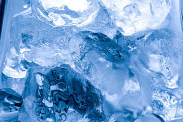 Ice melts in studio, global warming concept