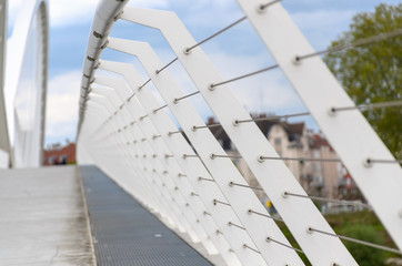 Receding perspective on railings on a bridge