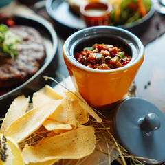 Chicken stew in a clay bowl