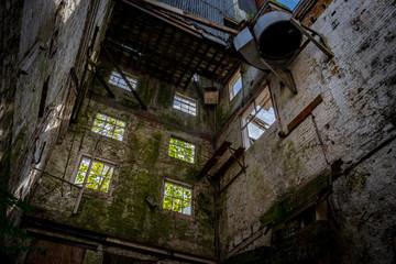 Fototapeta premium Inside a disused water mill