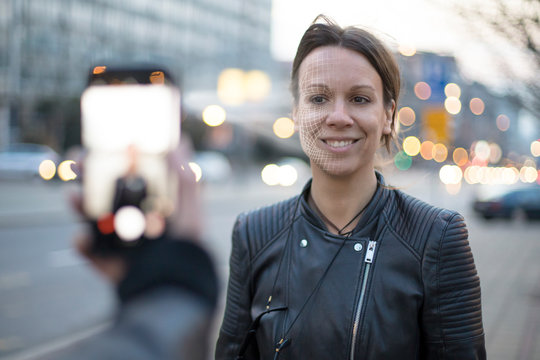 Face Recognition Software Working While Photographing A Young Woman