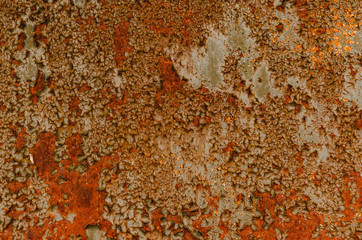 Rusty brown iron texture, green old fence with peeling paint. Textured wallpaper for design.