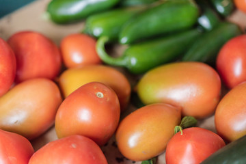 Fresh red organic tomatoes, all good for a healthy juicy vegetarian salad