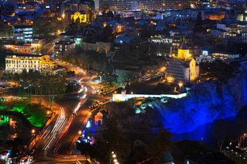 Cityscape of night Tbilisi, Georgia. The main object of the photo is the temple of Metekhi.