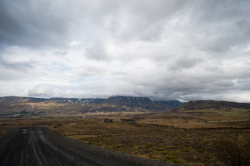 dark clouds over mountains