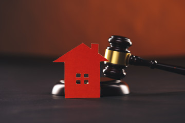 Close up view of gavel and house