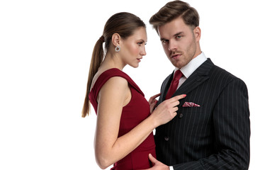 Confident amorous couple embraceing each other