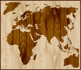 Europe, Asia and Africa map on wood background