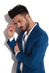 Side view of a thoughtful man looking away