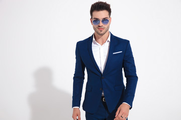 Tough young man bravely walking to the camera