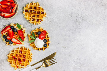 Traditional belgian waffles with fresh berries