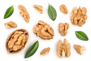 Walnuts with leaf isolated on white background. Top view. Flat lay