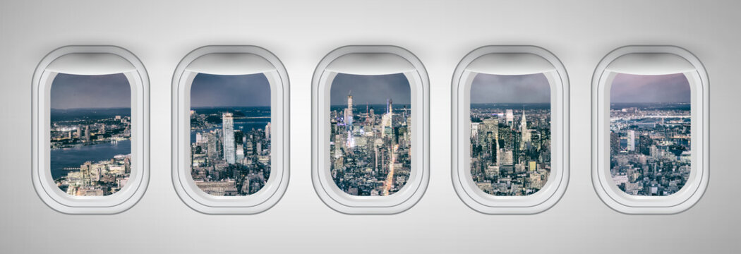 Fototapeta New York City at night as seen through five aircraft windows. Holiday and travel concept